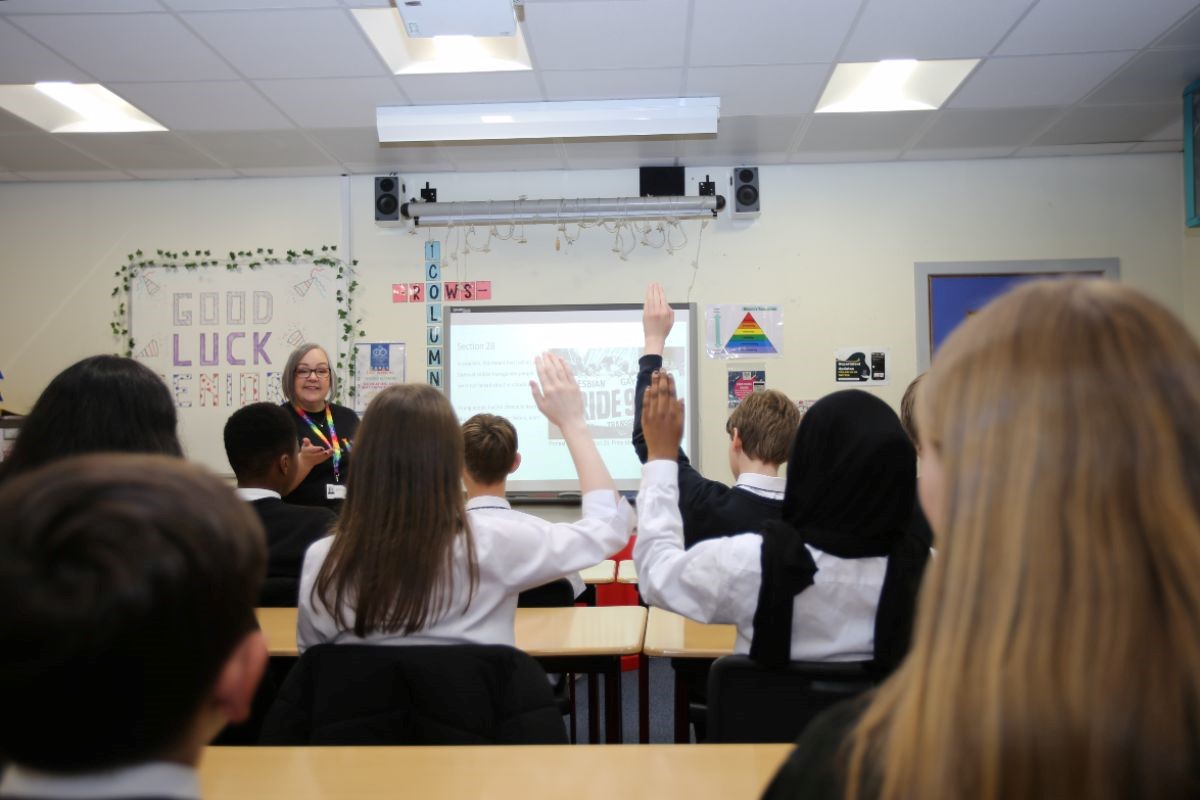Photograph of pupils in a classroom engaging in the lesson